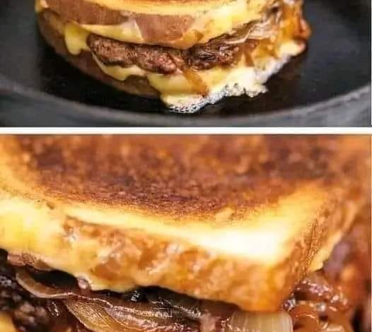 Patty Melt clásica: carne jugosa, queso derretido y cebollas caramelizadas doradas rodeadas de pan tostado con mantequilla